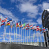 Stockshots of flags in front of EP building