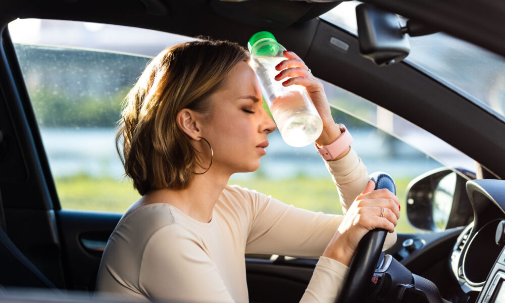 Exhausted,Woman,Driver,Feeling,Headache,,Sitting,Inside,Her,Car,,Applies