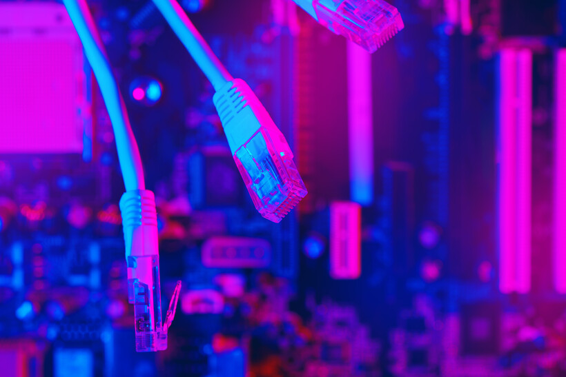 Modern technology network cable in neon light.