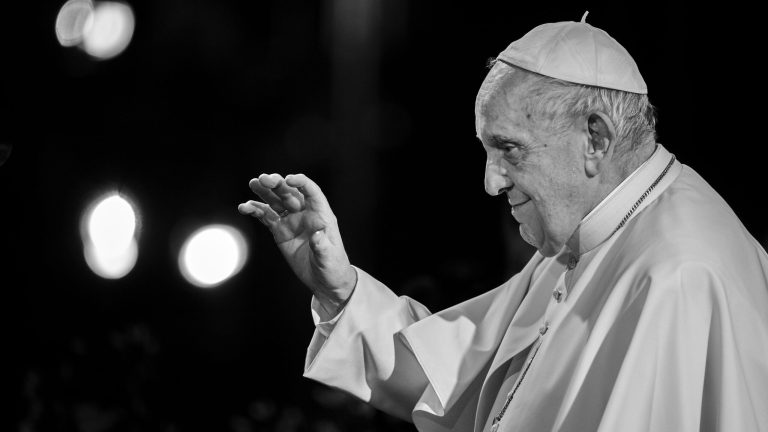 Pope francis during the via crucis (way of the cross) torchlight procession at the ancient colosseum (colosseo, colisee) on good friday. vatican.